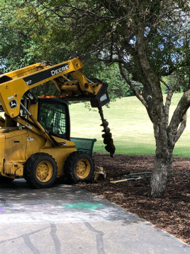 machinery breaking ground for a storywalk station