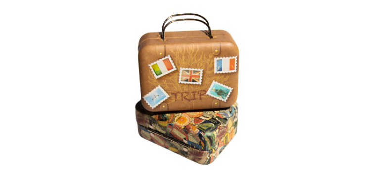 suitcases with travel stickers